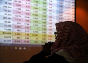A Saudi trader monitors stocks at the Saudi stock market