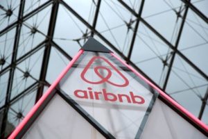 FILE PHOTO: Airbnb logo is seen on a little mini