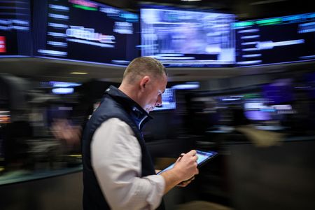 S&P 500, Nasdaq end down as investors wait for CPI, PPI data