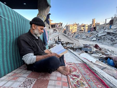 Gaza’s displaced break their Ramadan fast with canned food in the rubble